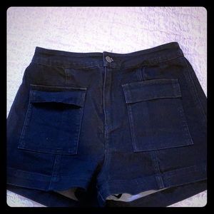 High waisted black shorts.